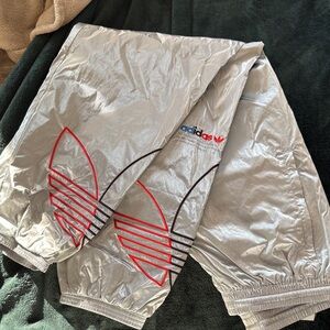 Adidas Silver metallic adicolor Track Pants with Black, red, and blue